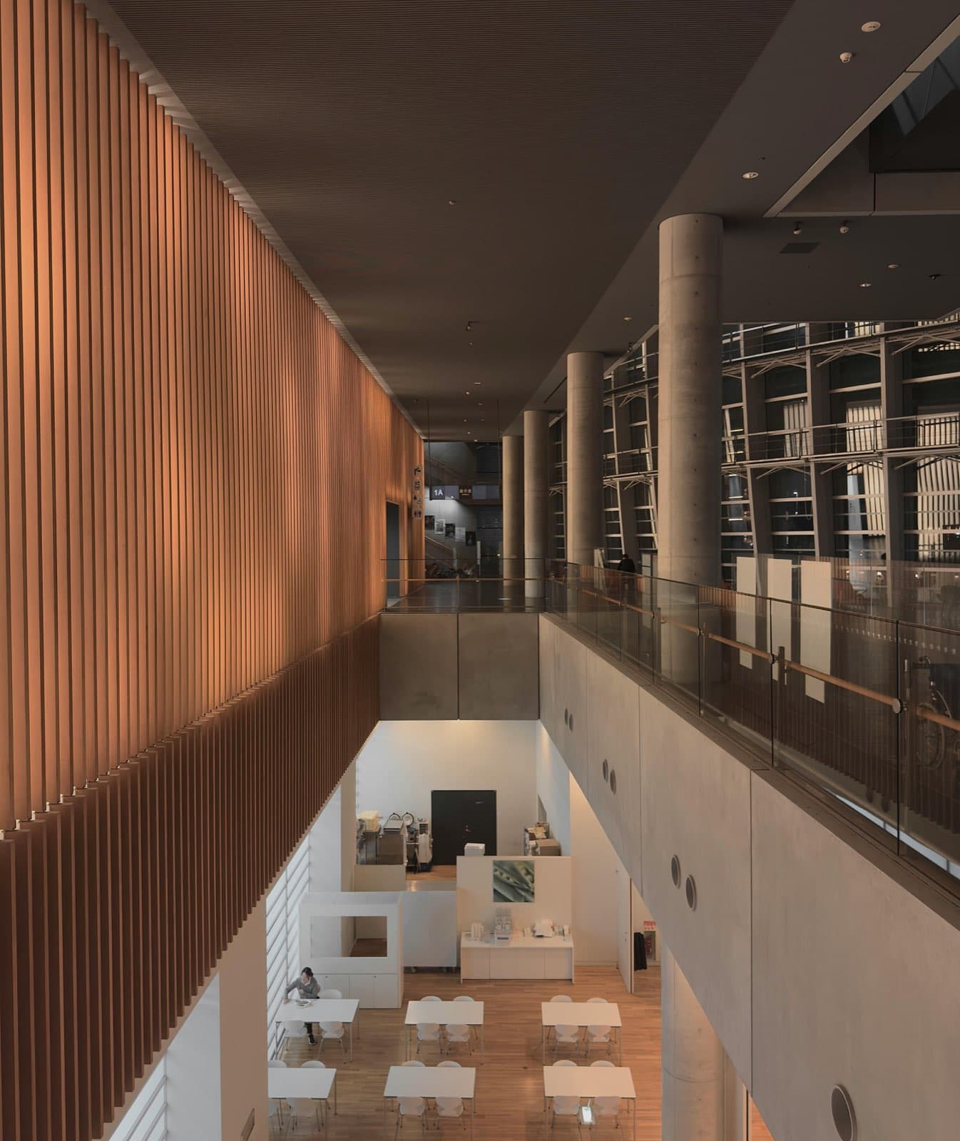 Grand modern interior with vertical wood rhythm and quiet light